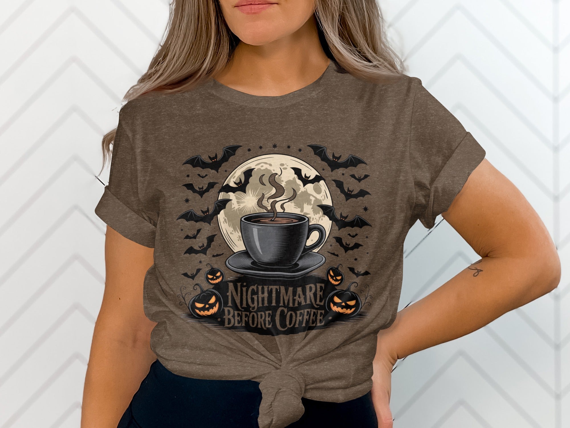 Coffee cup with steam, bats, pumpkins, and text "Nightmare Before Coffee".