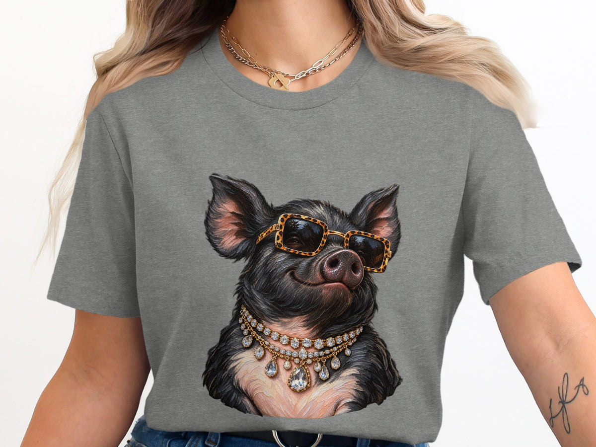 Pig with sunglasses and diamond necklaces printed on a gray t-shirt.