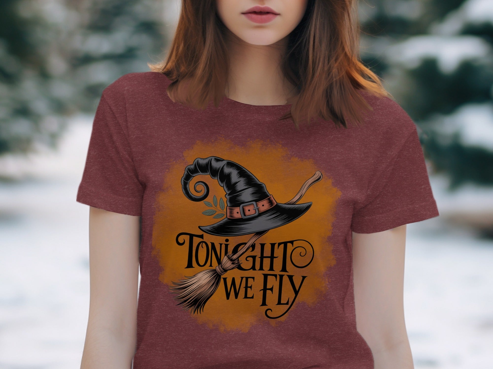 Black witch hat and broom graphic with text "Tonight we fly".