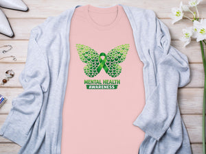 Pink t-shirt with green butterfly design and "Mental Health Awareness" text.