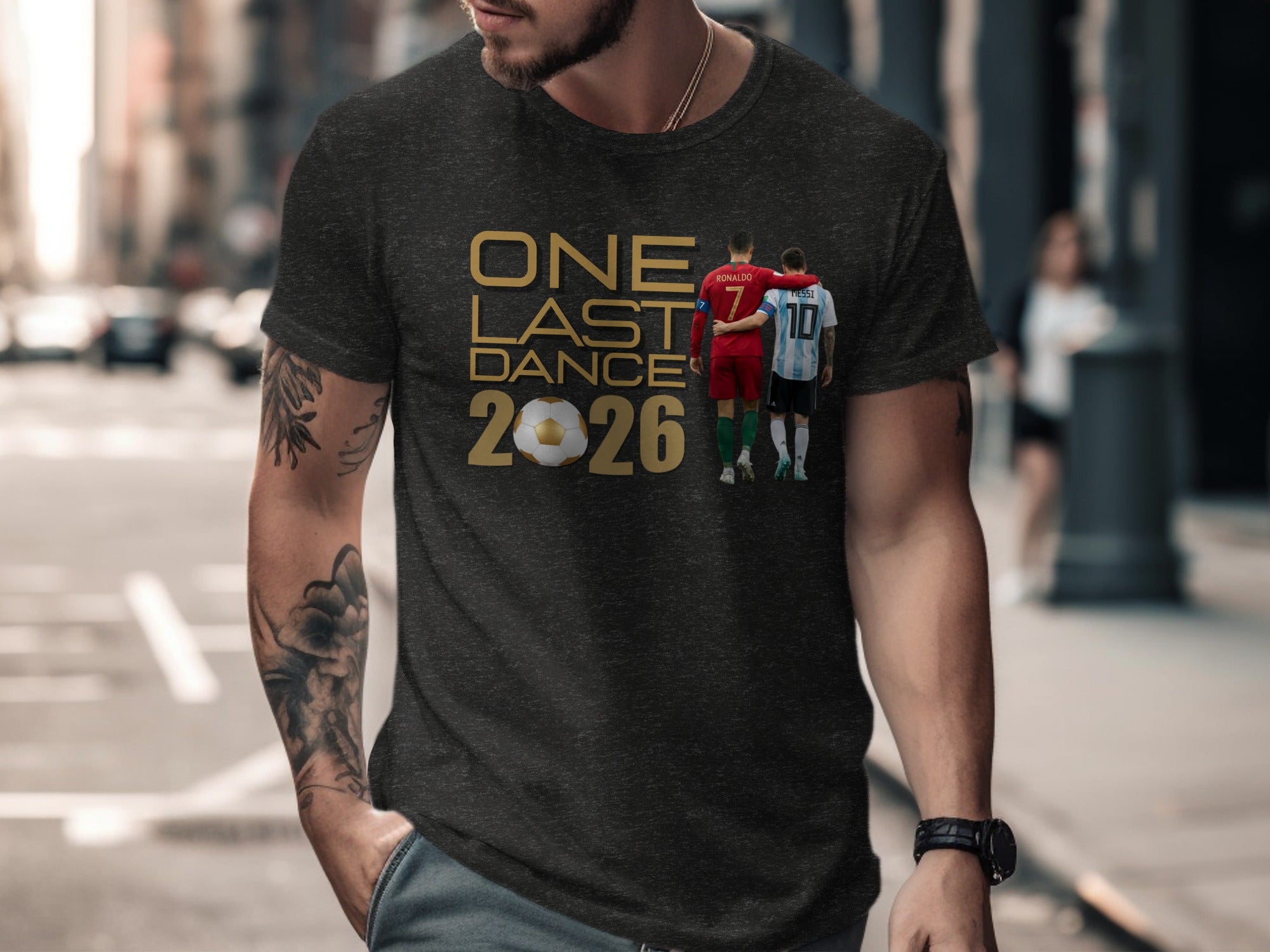 Dark grey t-shirt with "One Last Dance 2026" and soccer graphic.