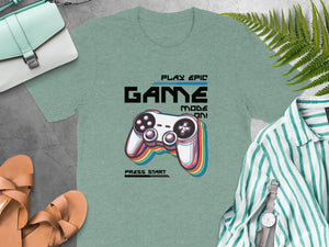 Green t-shirt with "GAME MODE ON!" text and console controller graphic.