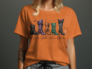 Orange t-shirt with five witch boots and text "A Girl's Gotta Have Options".