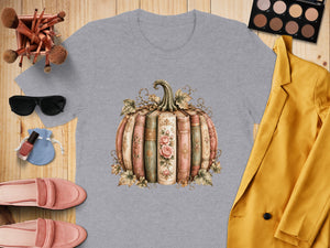 Grey t-shirt with a pumpkin made of antique books graphic.
