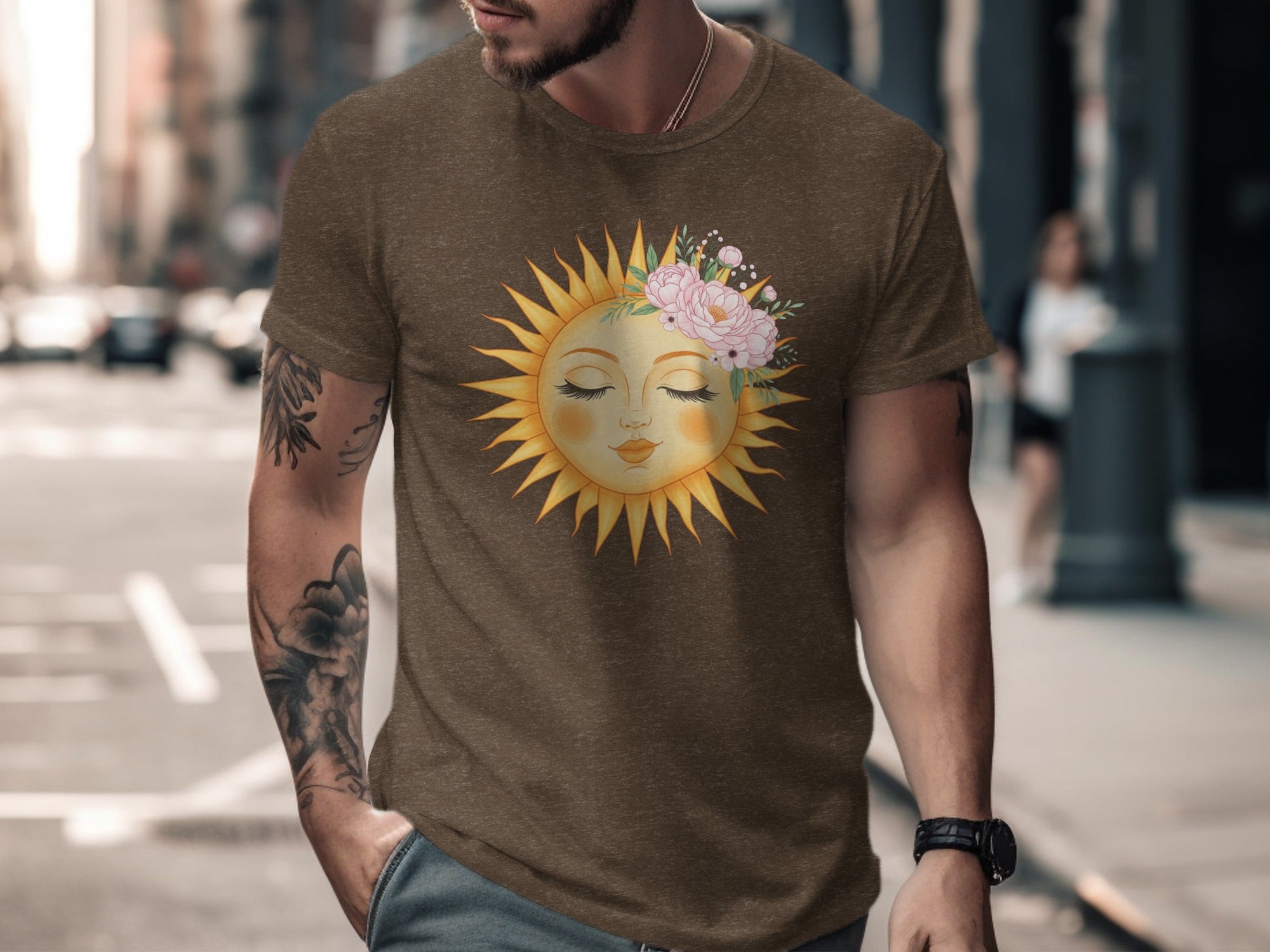 Brown t-shirt with a sun graphic adorned with pink flowers and leaves.