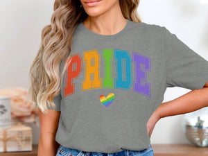 Gray t-shirt with colorful "PRIDE" text and rainbow heart graphic.