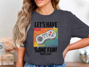 Gray t-shirt with "LET'S HAVE SOME FUN! PRESS START" and a video game controller.