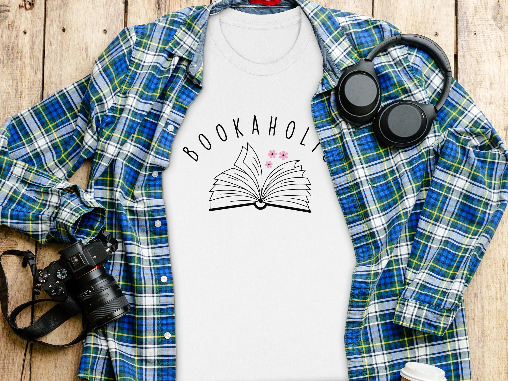 White t-shirt with "BOOKAHOLIC" and open book graphic.
