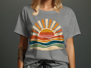 Grey t-shirt with a retro sunset graphic featuring colorful wavy lines.