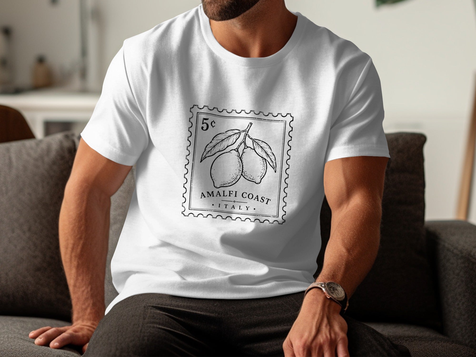 White t-shirt with a black stamp design featuring lemons and text.