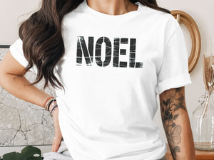 White t-shirt with distressed black "NOEL" text across the chest.
