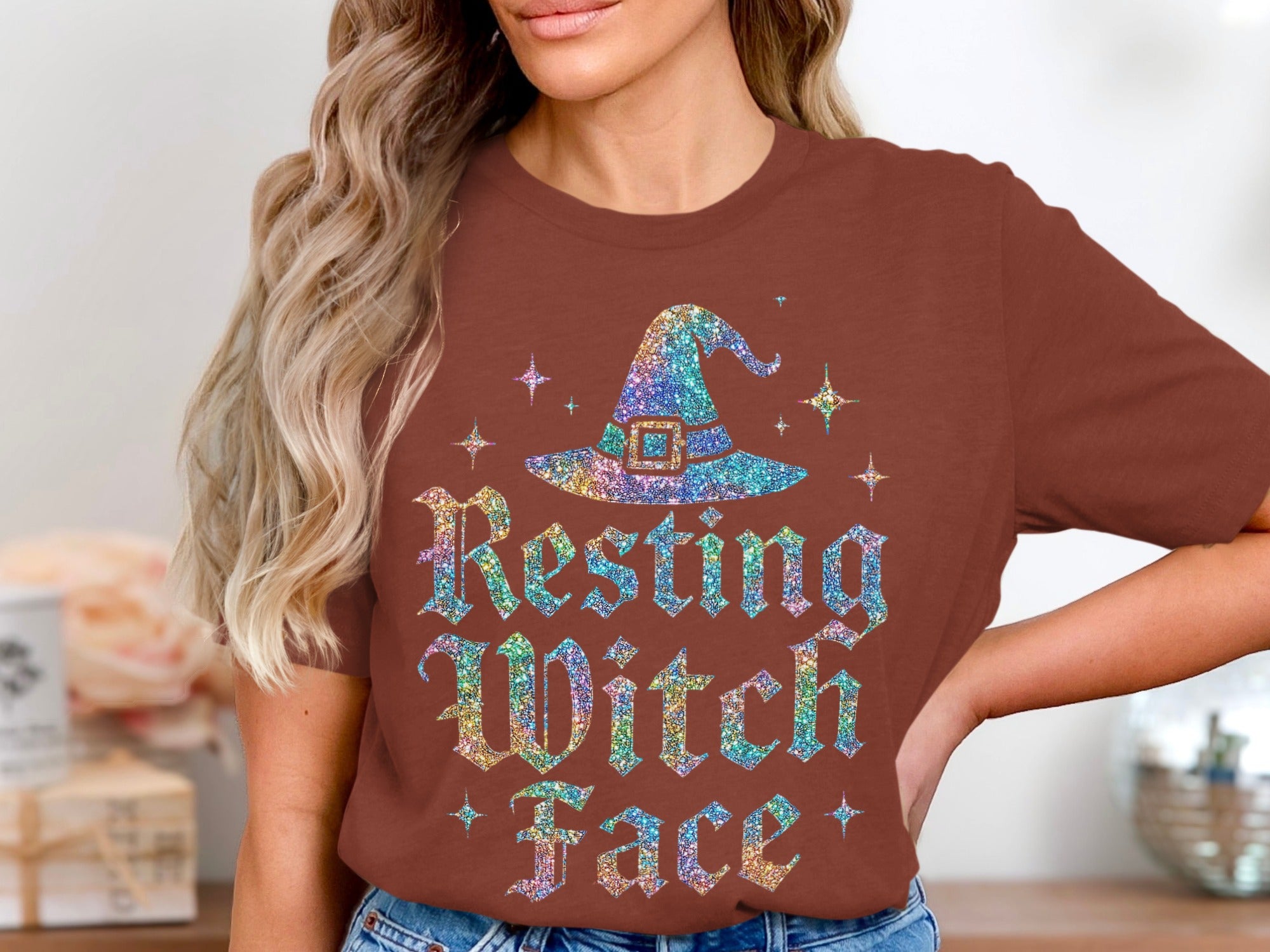 Brown t-shirt with a sparkly witch hat and text "Resting Witch Face".