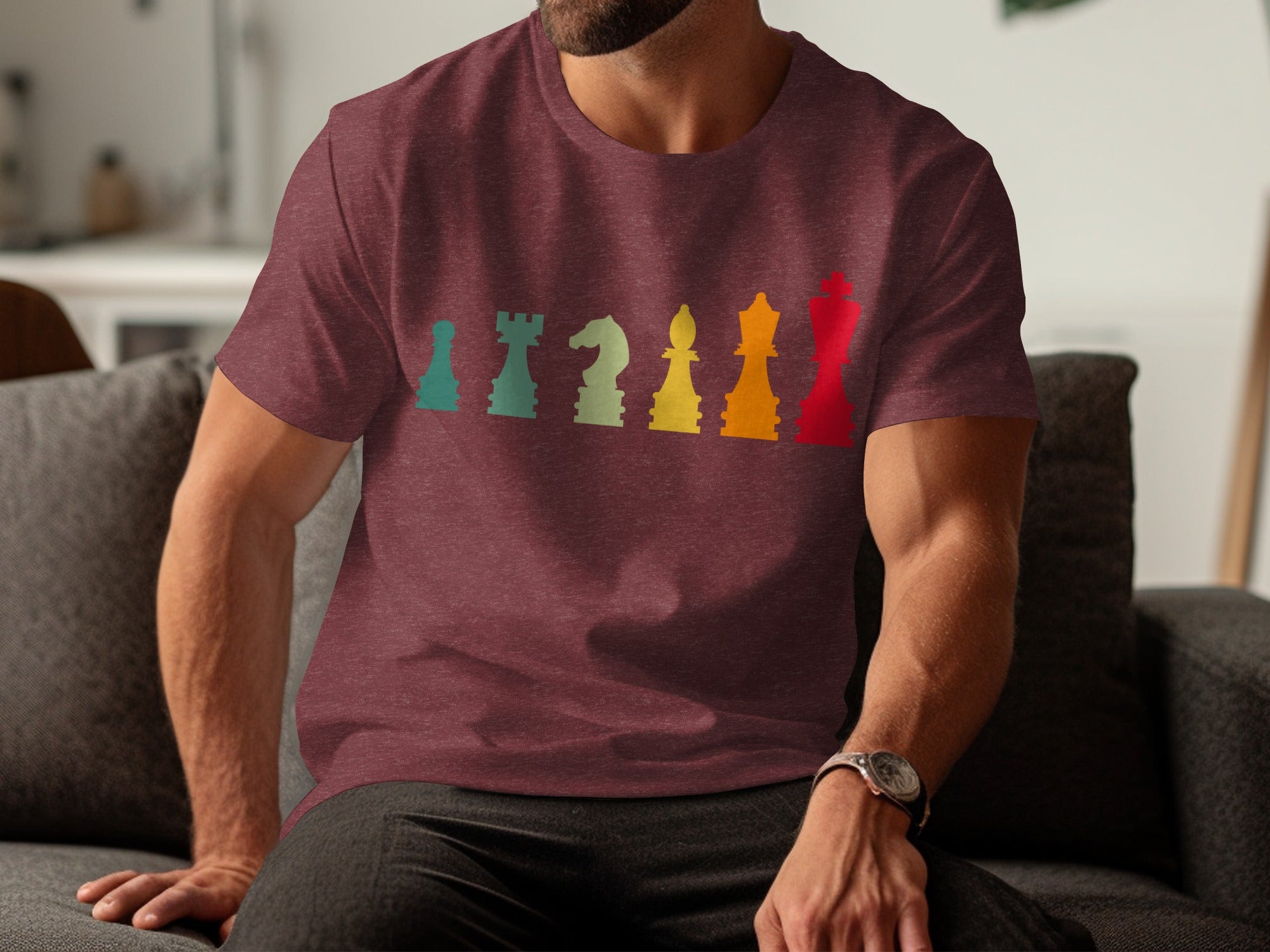 Burgundy t-shirt with colorful chess pieces design.