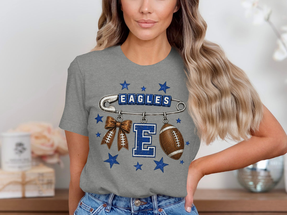 Grey t-shirt with "EAGLES" text, football, bow, and E graphic.