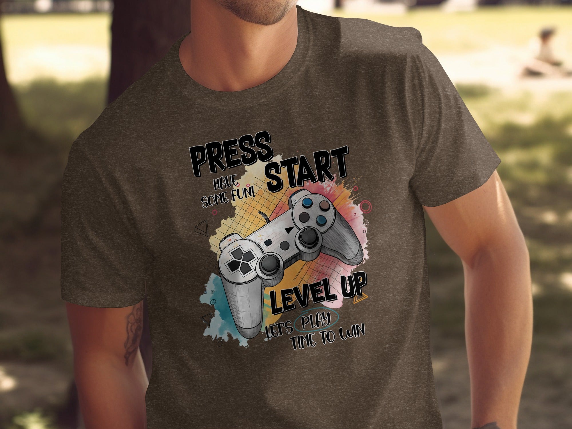 Brown t-shirt with "Press Start", "Have Some Fun!", and "Level Up Let's Play Time to Win" text.