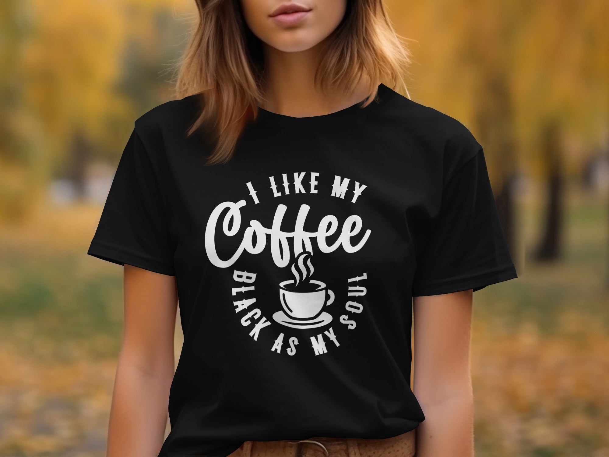 Black t-shirt with white text "I like my coffee black as my soul" and coffee cup graphic.