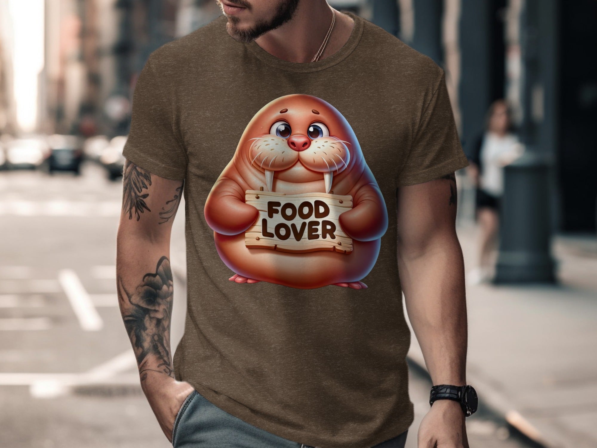 Cartoon walrus holding a "Food Lover" sign on a brown t-shirt.