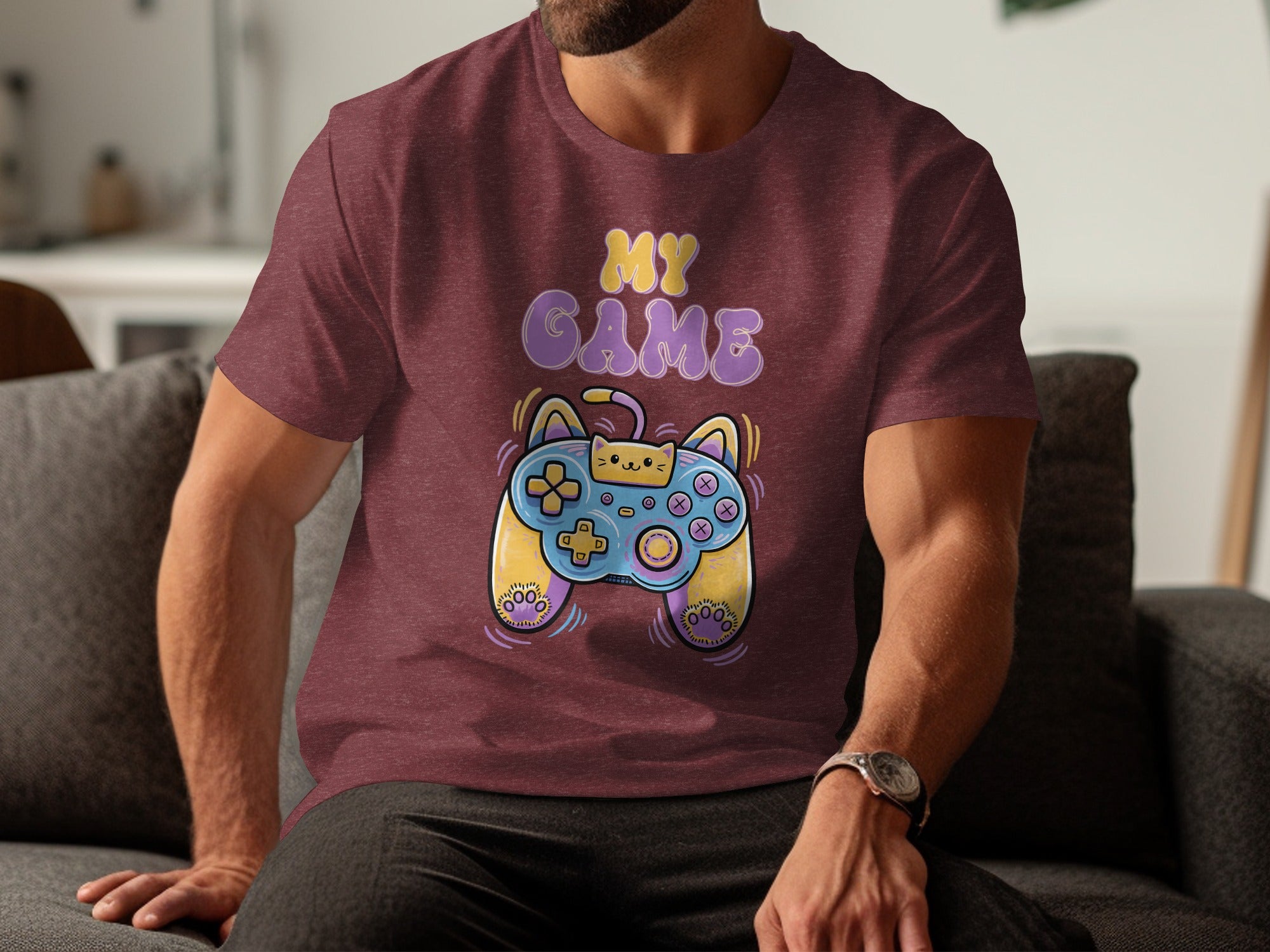Maroon t-shirt with cartoon cat-themed game controller and text "MY GAME".