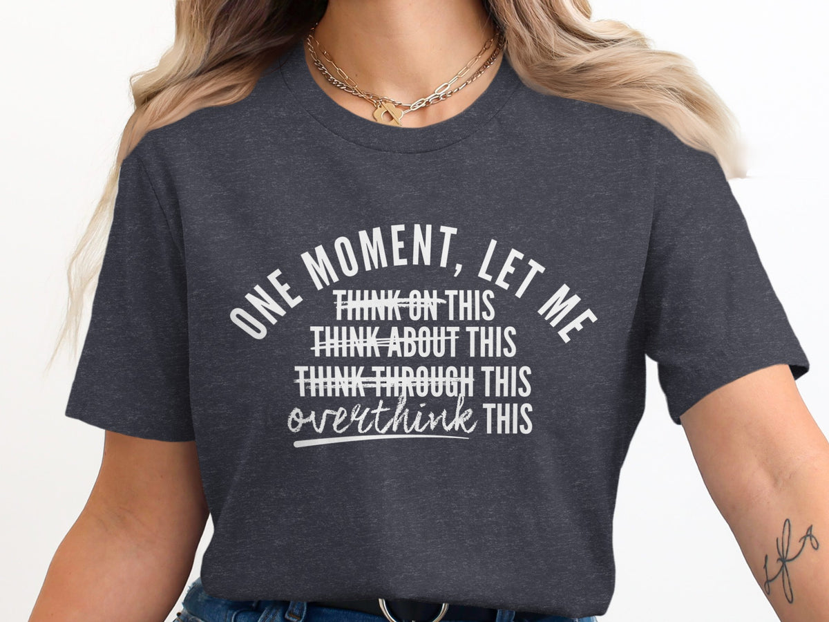 Dark grey t-shirt with "One moment, let me overthink this" text.