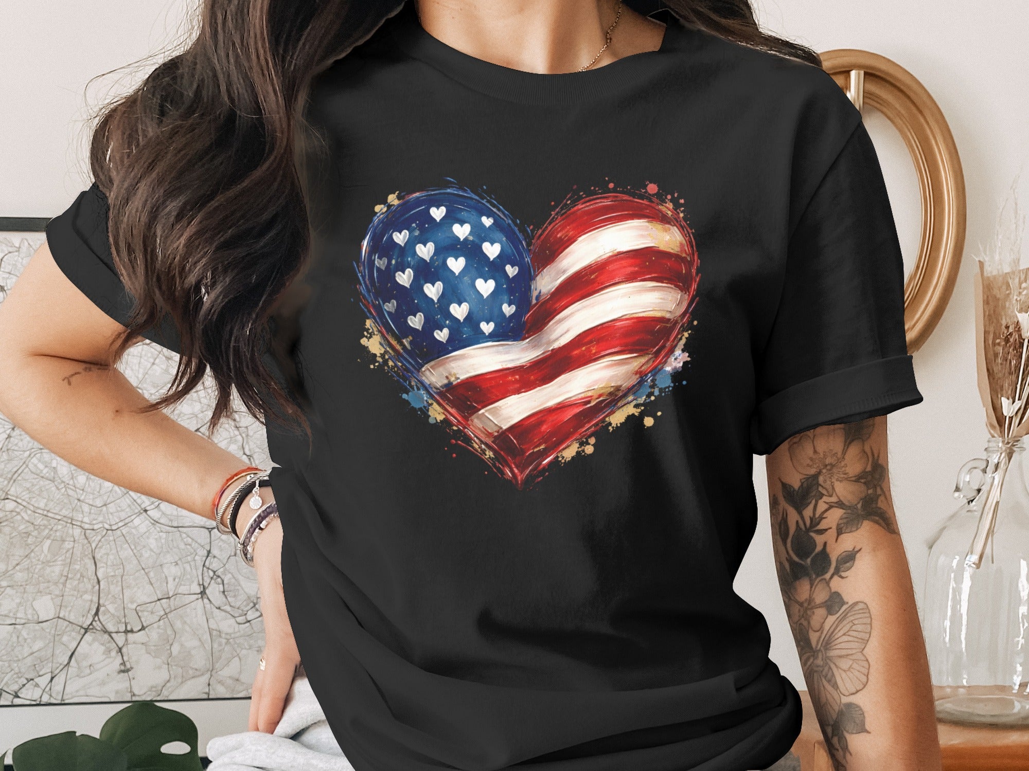 Black t-shirt with a watercolor American flag heart graphic.